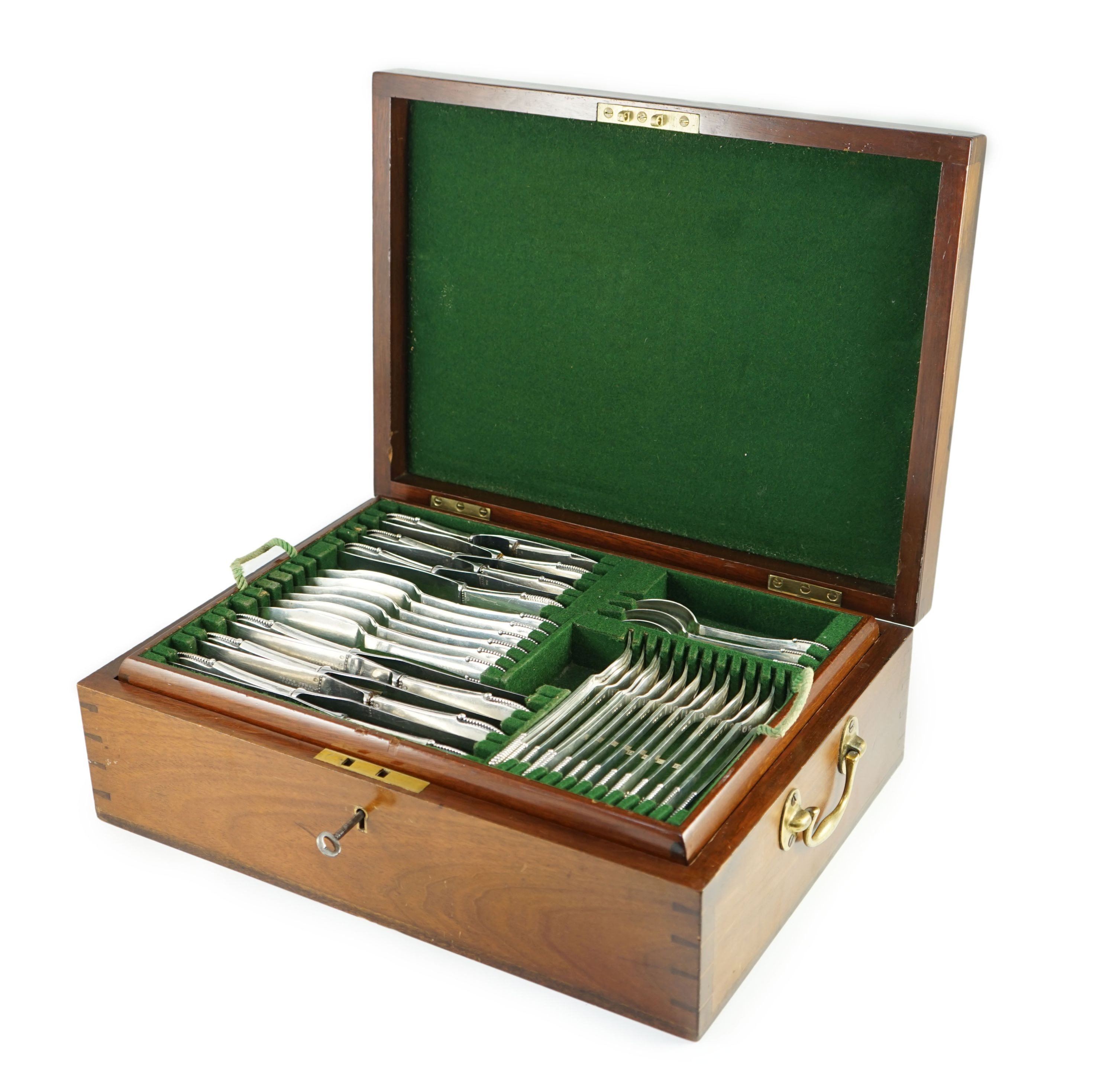 An early 20th century Georg Jensen canteen of beaded pattern silver cutlery